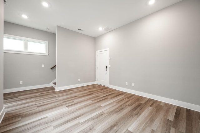 745 Burnside Pl, Chattanooga, TN 37408 - empty room featuring stairway, light wood finished floors, and recessed lighting