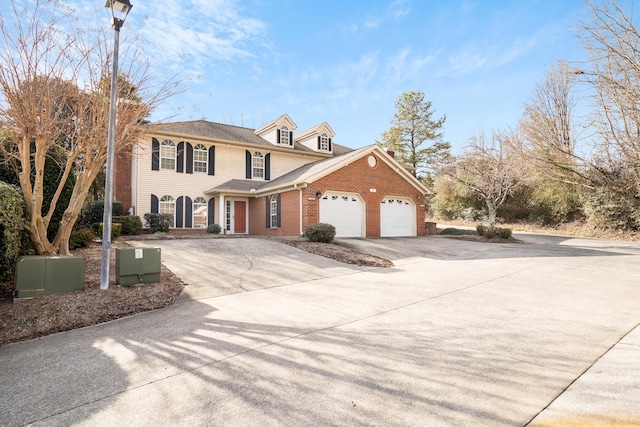 601 Black Oak Dr Unit 118, Dalton, GA 30721 - view of front of property featuring concrete driveway, a garage, and brick siding