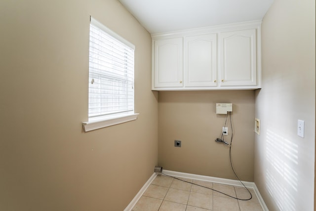 601 Black Oak Dr Unit 118, Dalton, GA 30721 - washroom with washer hookup, electric dryer hookup, cabinet space, and light tile patterned flooring