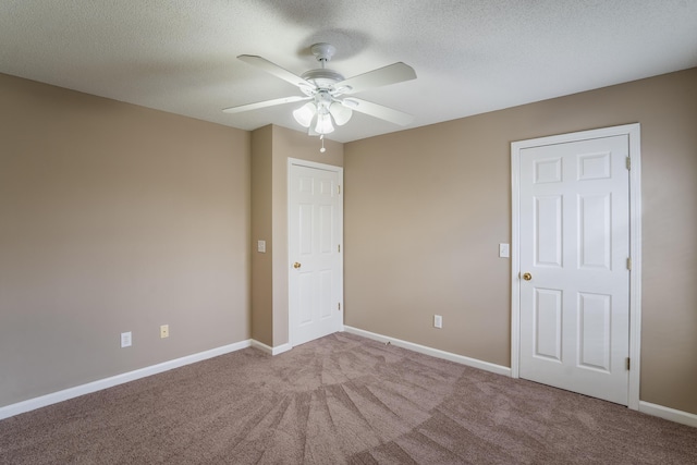 601 Black Oak Dr Unit 118, Dalton, GA 30721 - unfurnished bedroom with carpet flooring, a ceiling fan, and a textured ceiling