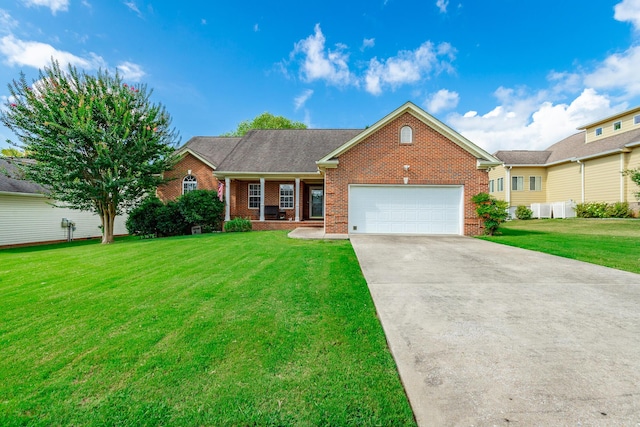 212 Cox Ln, Soddy Daisy, TN 37379 - ranch-style house featuring brick siding, a garage, a front lawn, and concrete driveway