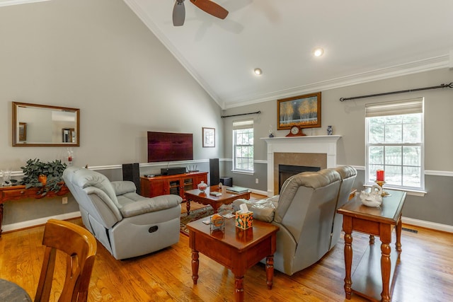 212 Cox Ln, Soddy Daisy, TN 37379 - living area featuring lofted ceiling, crown molding, wood finished floors, a fireplace, and ceiling fan
