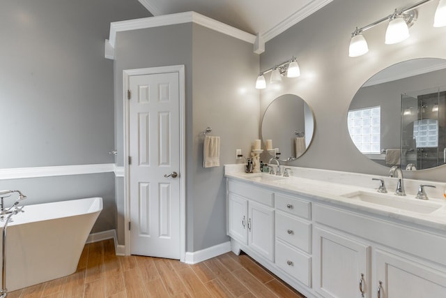 212 Cox Ln, Soddy Daisy, TN 37379 - full bath featuring crown molding, double vanity, a freestanding tub, wood finished floors, and a shower