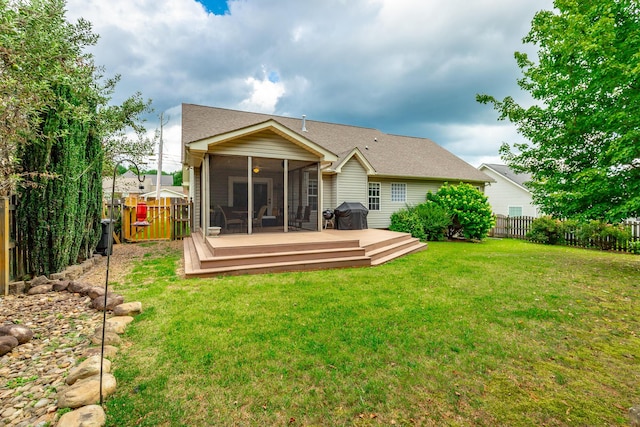 212 Cox Ln, Soddy Daisy, TN 37379 - rear view of property featuring a sunroom, a fenced backyard, and a wooden deck