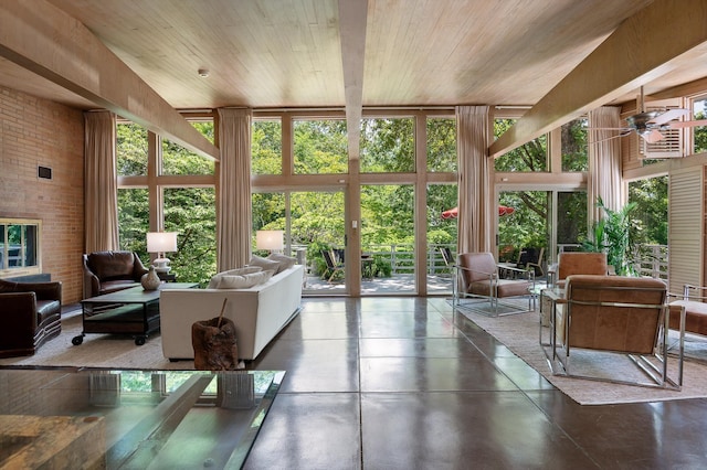 2554 Crestwood Dr, Chattanooga, TN 37415 - living area with floor to ceiling windows, finished concrete floors, wooden ceiling, and ceiling fan