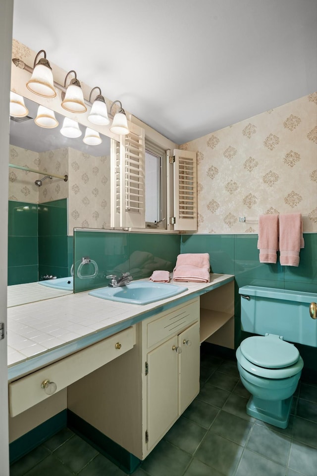 2554 Crestwood Dr, Chattanooga, TN 37415 - bathroom with wallpapered walls, a wainscoted wall, vanity, tile patterned flooring, and a shower