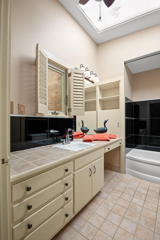 2554 Crestwood Dr, Chattanooga, TN 37415 - full bath with ceiling fan, vanity, tile patterned flooring, and a tub