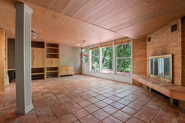 2554 Crestwood Dr, Chattanooga, TN 37415 - unfurnished living room featuring rail lighting and wood ceiling