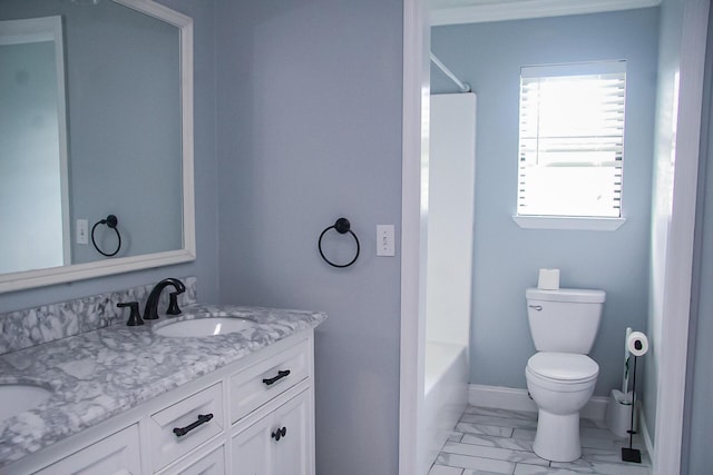 2730 Windthrush Dr, Chattanooga, TN 37421 - bathroom featuring marble look tiles, double vanity, and tub / shower combination