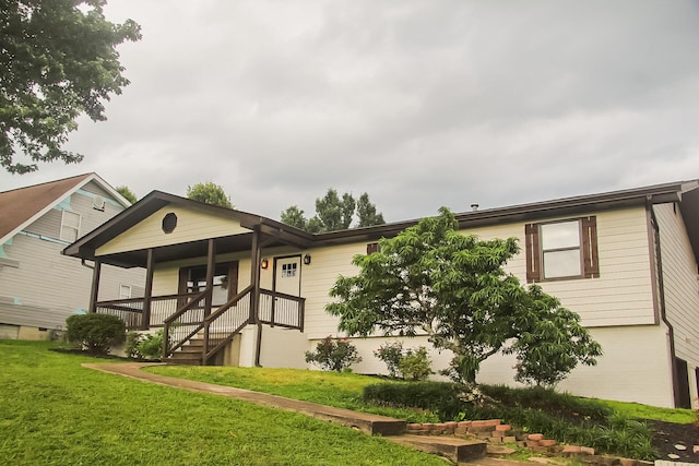 2730 Windthrush Dr, Chattanooga, TN 37421 - ranch-style house featuring a front yard, a porch, and stairway