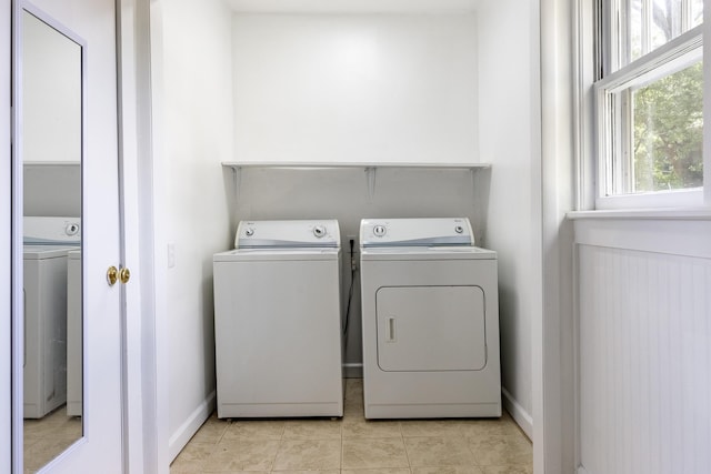 11387 Spring St, Soddy Daisy, TN 37379 - laundry room with separate washer and dryer and light tile patterned flooring