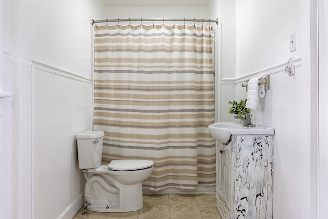 11387 Spring St, Soddy Daisy, TN 37379 - bathroom with tile patterned floors, a wainscoted wall, and curtained shower