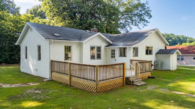 11387 Spring St, Soddy Daisy, TN 37379 - rear view of house featuring a yard, stucco siding, a chimney, a deck, and a shingled roof