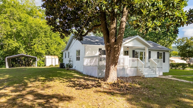 11387 Spring St, Soddy Daisy, TN 37379 - bungalow with a carport, a porch, and a front yard