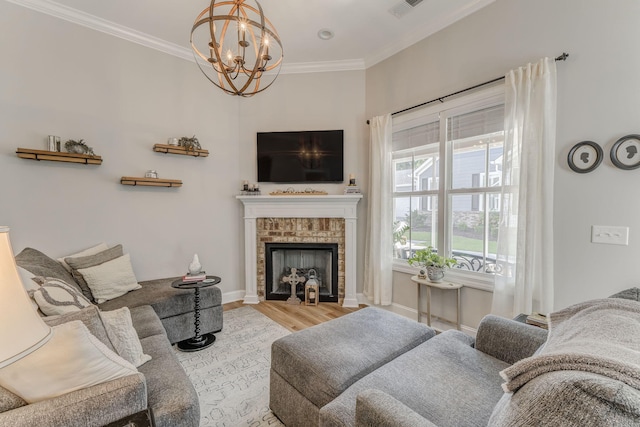 320 Kempton Ln Unit 2, Dalton, GA 30721 - living area featuring wood finished floors, ornamental molding, a fireplace, and a chandelier