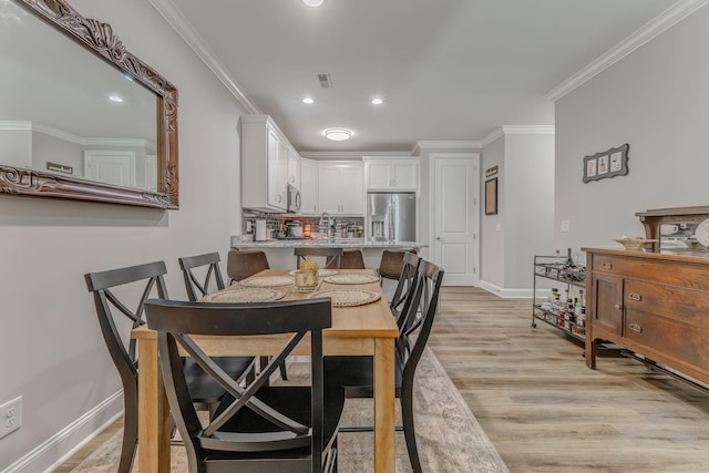 320 Kempton Ln Unit 2, Dalton, GA 30721 - dining area with ornamental molding, light wood-style floors, and recessed lighting