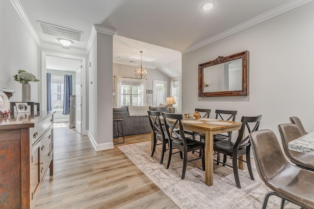 320 Kempton Ln Unit 2, Dalton, GA 30721 - dining area featuring light wood-style floors, ornamental molding, a chandelier, and vaulted ceiling
