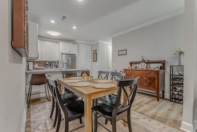 320 Kempton Ln Unit 2, Dalton, GA 30721 - dining space with ornamental molding, light wood-style flooring, and recessed lighting