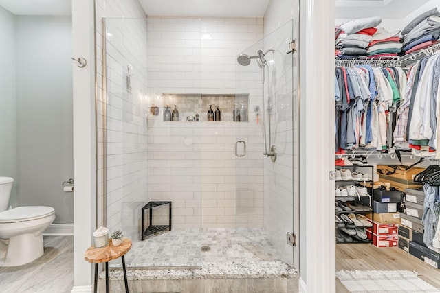 320 Kempton Ln Unit 2, Dalton, GA 30721 - full bath featuring a spacious closet, a stall shower, and wood finished floors