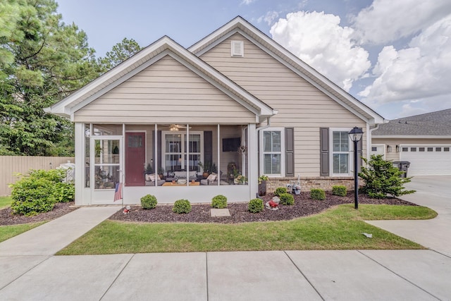 320 Kempton Ln Unit 2, Dalton, GA 30721 - view of front of house with a sunroom, driveway, and a garage