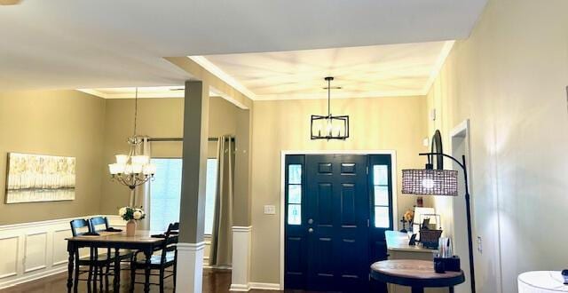 8041 Hamilton Mill Dr, Chattanooga, TN 37421 - foyer entrance with a chandelier, crown molding, and dark wood-style floors