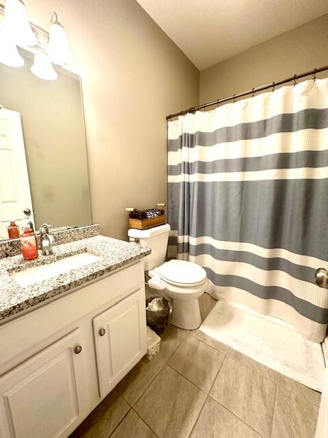 8041 Hamilton Mill Dr, Chattanooga, TN 37421 - full bath featuring tile patterned floors, vanity, and a shower with curtain