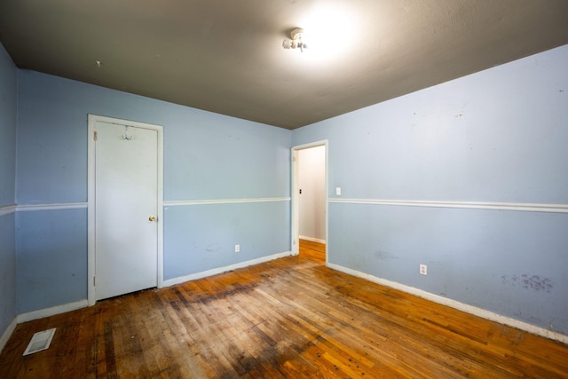 7635 Austin Dr, Chattanooga, TN 37416 - unfurnished room with wood-type flooring and baseboards
