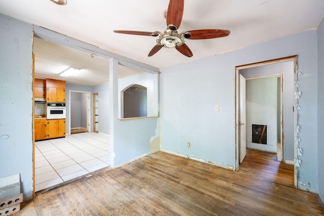 7635 Austin Dr, Chattanooga, TN 37416 - unfurnished living room with light wood-style floors and a ceiling fan