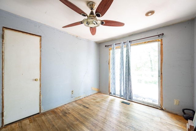 7635 Austin Dr, Chattanooga, TN 37416 - empty room featuring a ceiling fan and wood finished floors