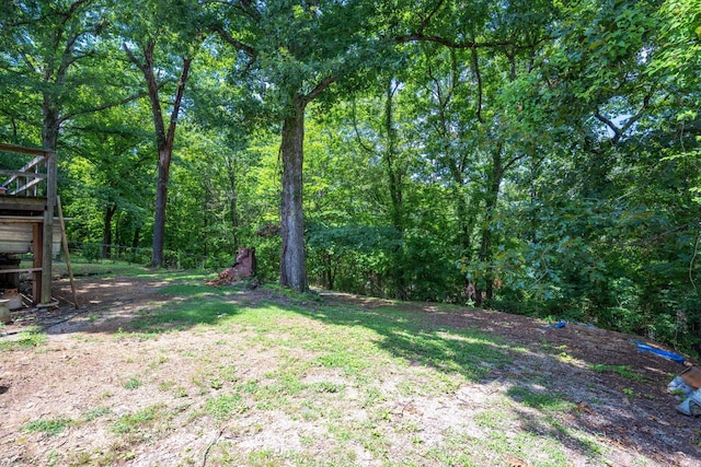 7635 Austin Dr, Chattanooga, TN 37416 - view of yard with a view of trees and a deck