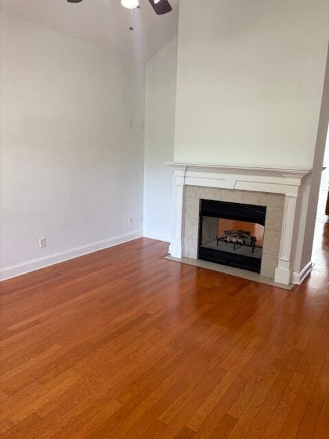 731 Callaway Ct, Chattanooga, TN 37421 - unfurnished living room featuring ceiling fan, a fireplace, and wood finished floors