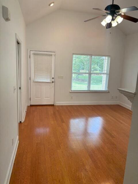 731 Callaway Ct, Chattanooga, TN 37421 - unfurnished living room featuring vaulted ceiling, ceiling fan, and light wood-type flooring