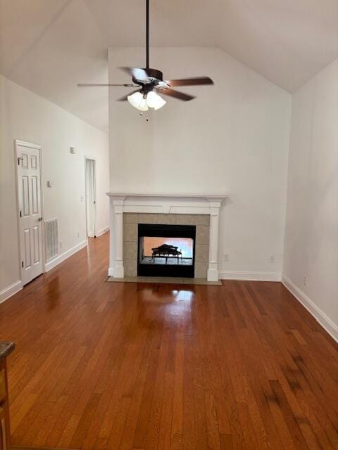 731 Callaway Ct, Chattanooga, TN 37421 - unfurnished living room featuring vaulted ceiling, wood finished floors, ceiling fan, and a fireplace