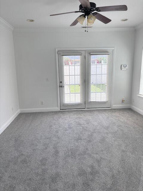 731 Callaway Ct, Chattanooga, TN 37421 - carpeted empty room featuring ornamental molding, plenty of natural light, and ceiling fan