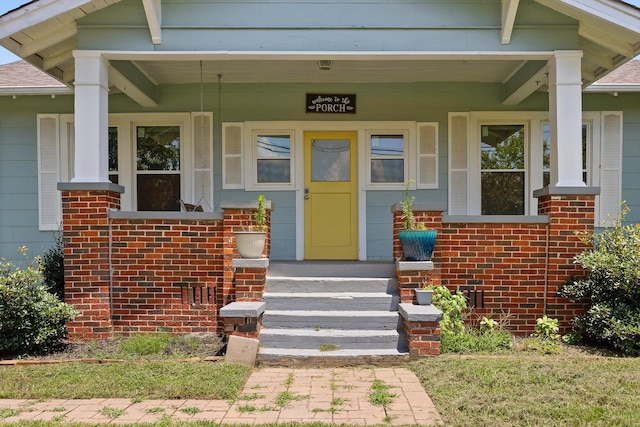 6863 Standifer Gap Rd, Chattanooga, TN 37421 - doorway to property featuring brick siding and covered porch