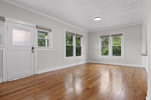 6863 Standifer Gap Rd, Chattanooga, TN 37421 - unfurnished room with plenty of natural light, wood finished floors, and crown molding