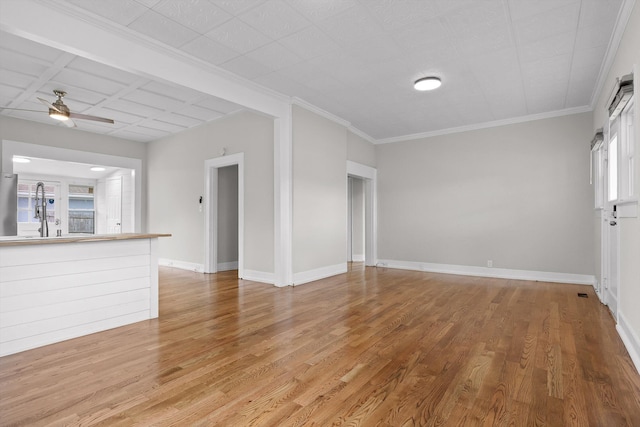 6863 Standifer Gap Rd, Chattanooga, TN 37421 - unfurnished living room featuring light wood finished floors, ceiling fan, and crown molding