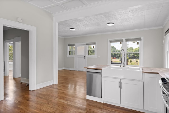 6863 Standifer Gap Rd, Chattanooga, TN 37421 - kitchen with dishwasher, wood finished floors, range, white cabinetry, and crown molding