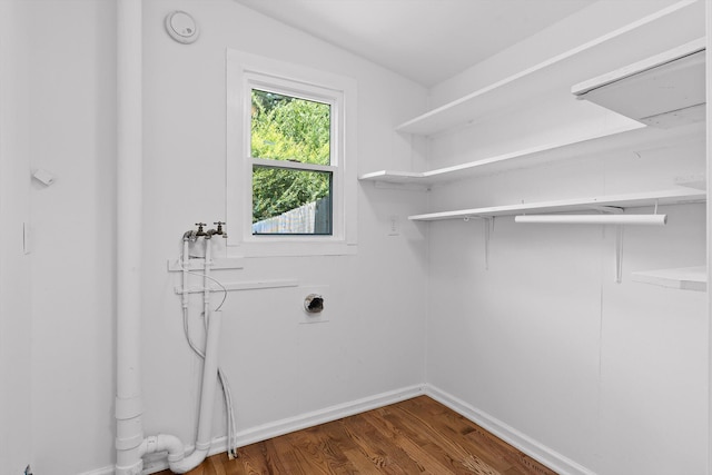 6863 Standifer Gap Rd, Chattanooga, TN 37421 - laundry room with dark wood-style flooring and hookup for an electric dryer