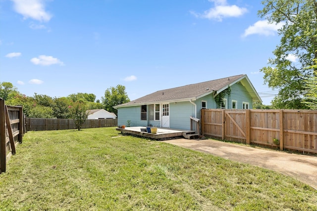 6863 Standifer Gap Rd, Chattanooga, TN 37421 - rear view of property featuring a fenced backyard, a deck, and a shingled roof