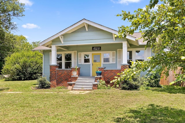 6863 Standifer Gap Rd, Chattanooga, TN 37421 - view of front facade featuring a front lawn and brick siding