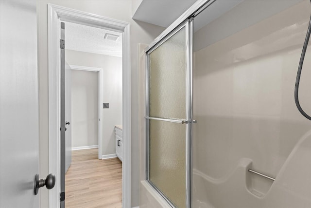 2219 Rocky Face Cir, Dalton, GA 30720 - full bathroom featuring wood finished floors and vanity