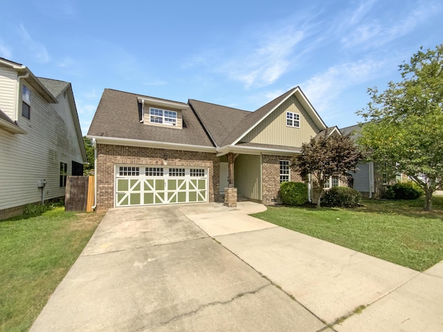 1783 Andover Pl, Chattanooga, TN 37421 - craftsman-style home featuring brick siding, an attached garage, and a front lawn
