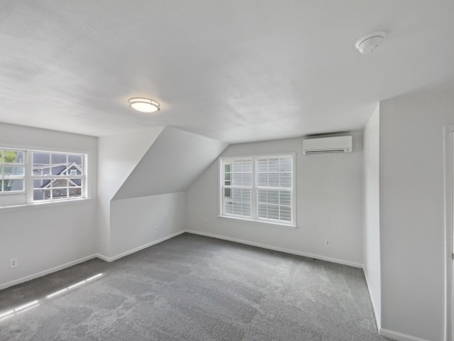 1783 Andover Pl, Chattanooga, TN 37421 - additional living space featuring an AC wall unit, plenty of natural light, carpet flooring, and lofted ceiling