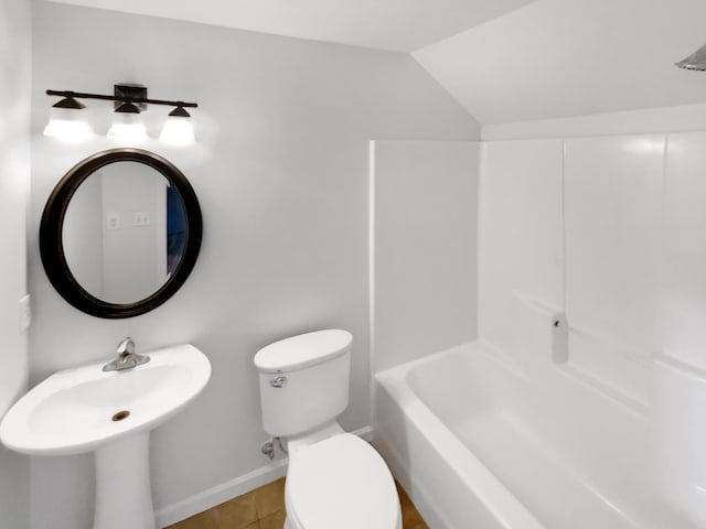1783 Andover Pl, Chattanooga, TN 37421 - bathroom with vaulted ceiling, tile patterned floors, and washtub / shower combination