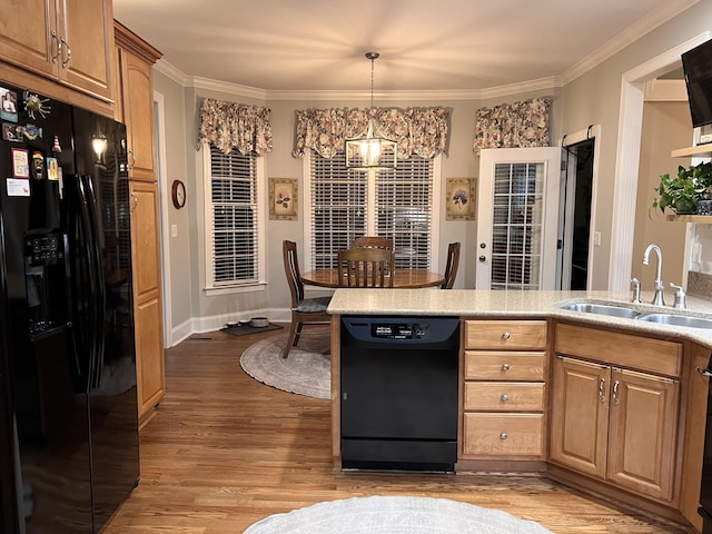8712 Brow Lake Rd, Soddy Daisy, TN 37379 - kitchen featuring black appliances, a chandelier, light wood-style floors, crown molding, and light countertops