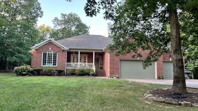 8712 Brow Lake Rd, Soddy Daisy, TN 37379 - single story home with a porch, a garage, roof with shingles, a front lawn, and brick siding