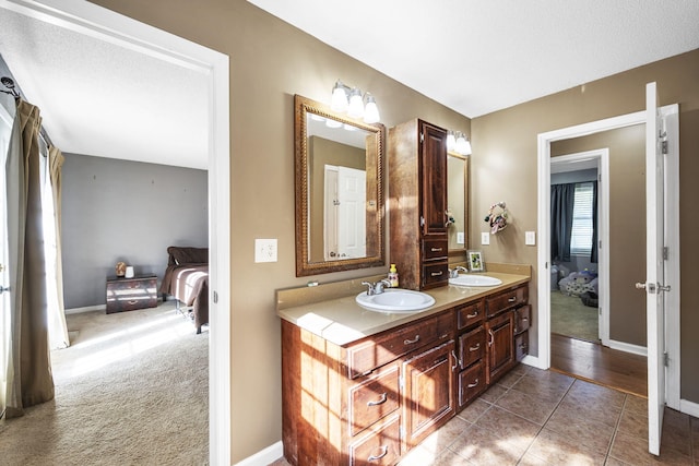7700 Dune Ln, Hixson, TN 37343 - full bath featuring ensuite bath, double vanity, and tile patterned floors