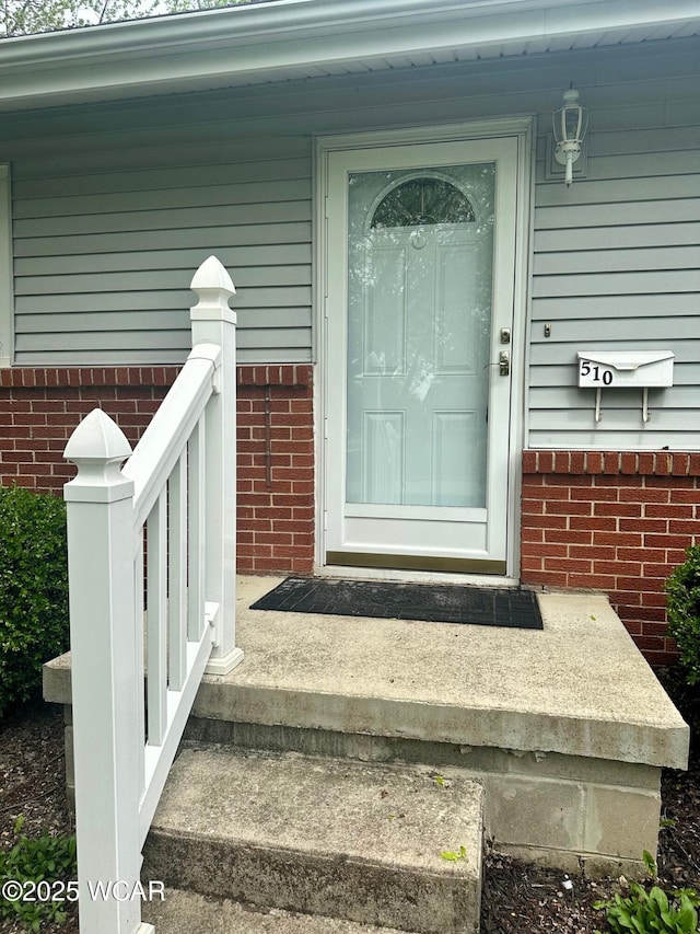 510 Rosewood Ave, Findlay, OH 45840 - doorway to property with brick siding