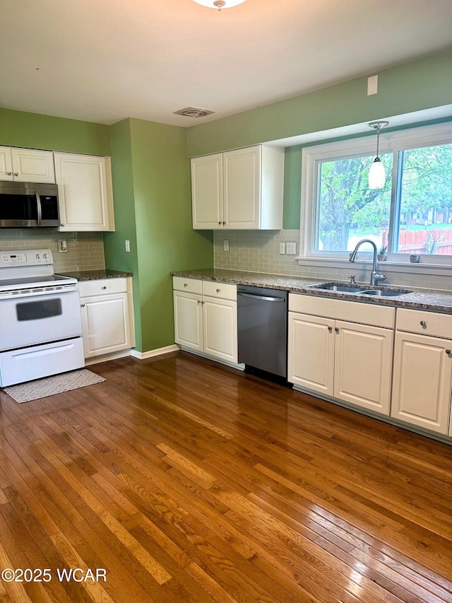 510 Rosewood Ave, Findlay, OH 45840 - kitchen with a sink, appliances with stainless steel finishes, and white cabinetry